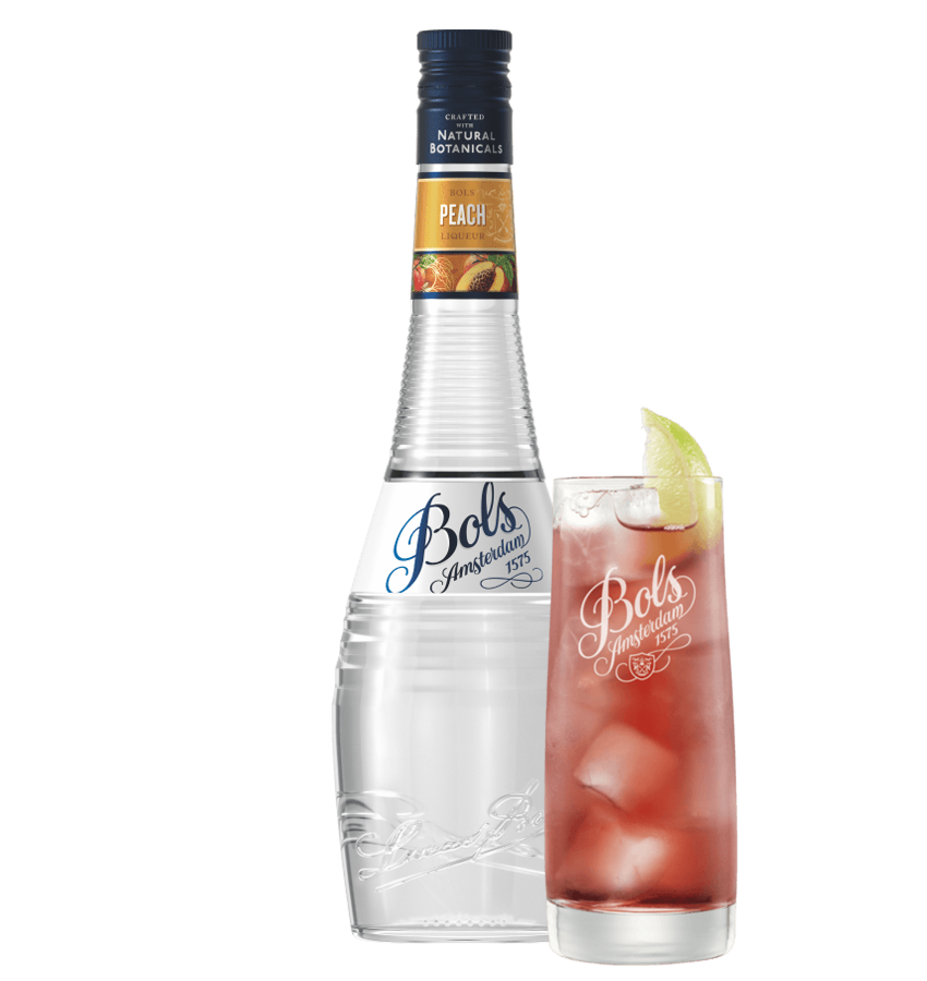 Bols Amsterdam peach liqueur bottle with a cocktail garnished with a peach slice on a white background